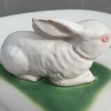 Pot terrine rabbit of Bavent in white earthenware on square of greenery