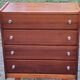 Vintage golden oak chest of drawers with 4 spindle feet from the 1950s