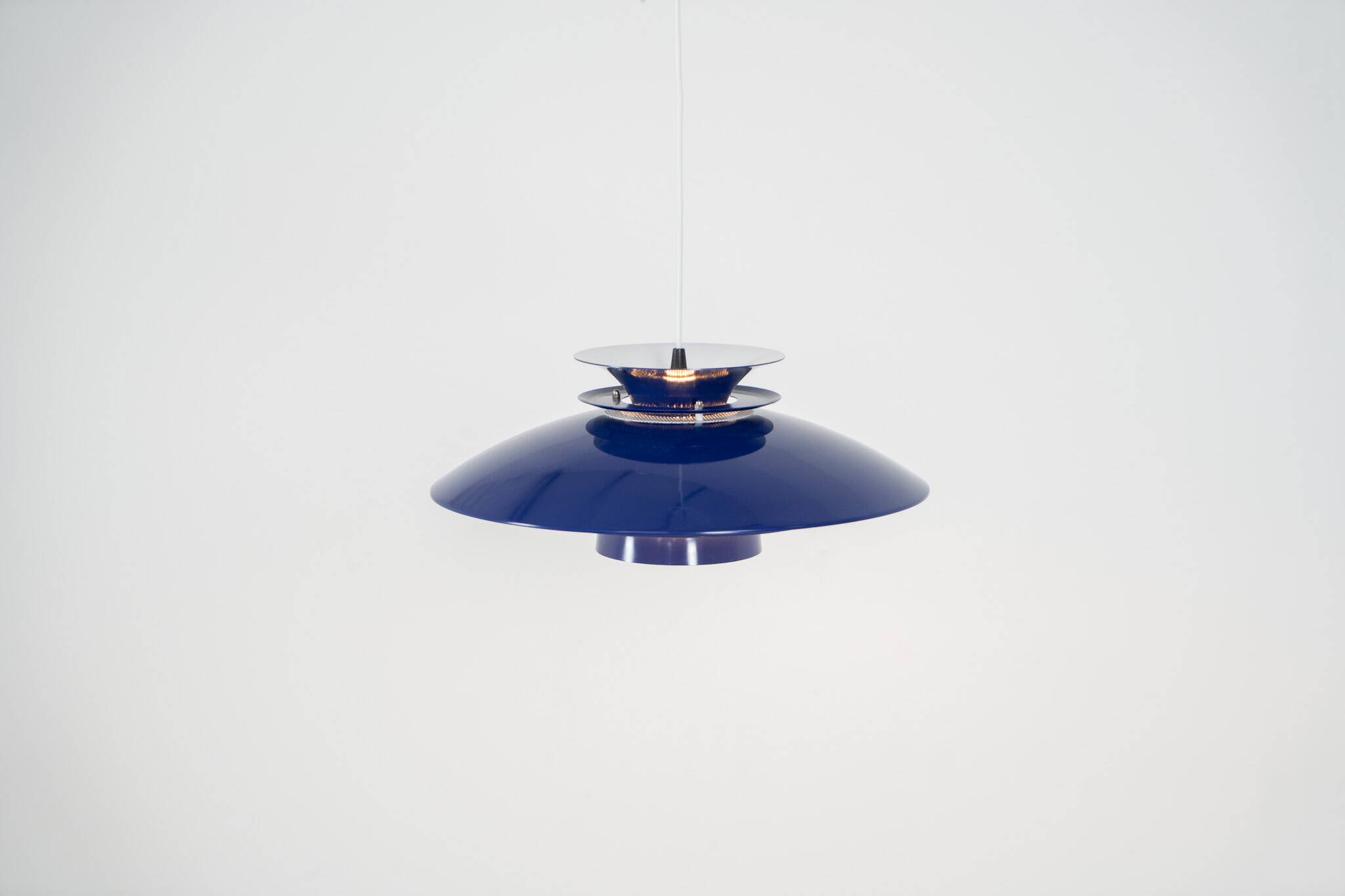 Elegant blue pendant light by Belux