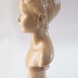 Bust of a young girl in plaster