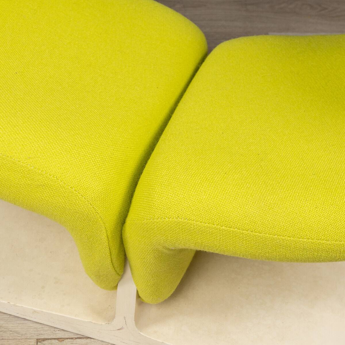 A 20thC RIBBON CHAIR & FOOTSTALL BY PIERRE PAULIN FOR ARTIFORT, FRANCE