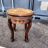 Old wooden saddle pedestal table with claw feet