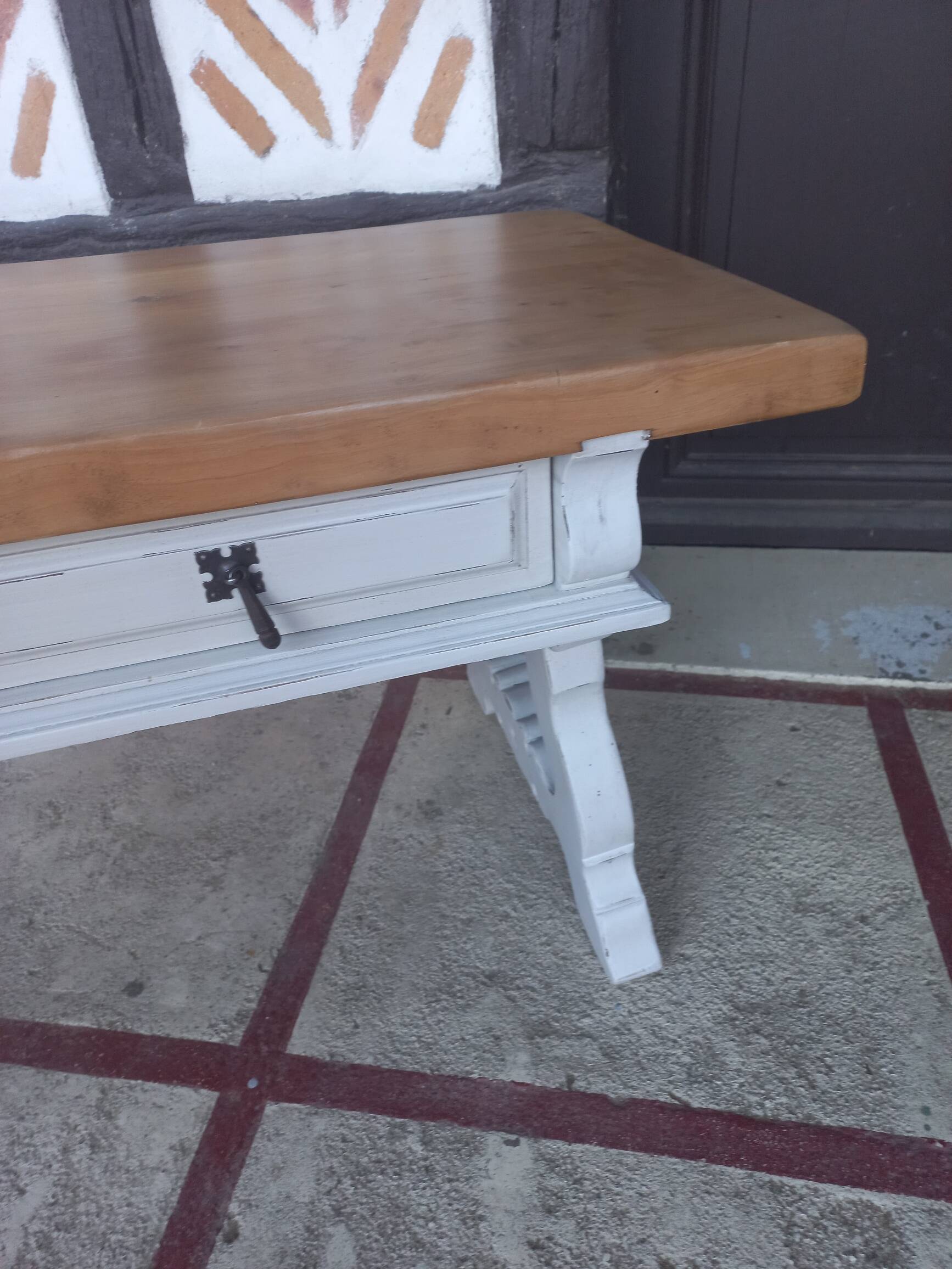 Patinated linen coffee table with raw top