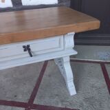 Patinated linen coffee table with raw top