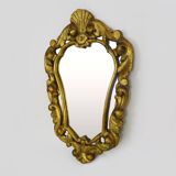 Old wall mirror in wood and gilded stucco with shell decoration, Louis XV style pediment mirror
