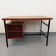 Vintage modernist double-sided desk in mahogany and black metal from the 1960s