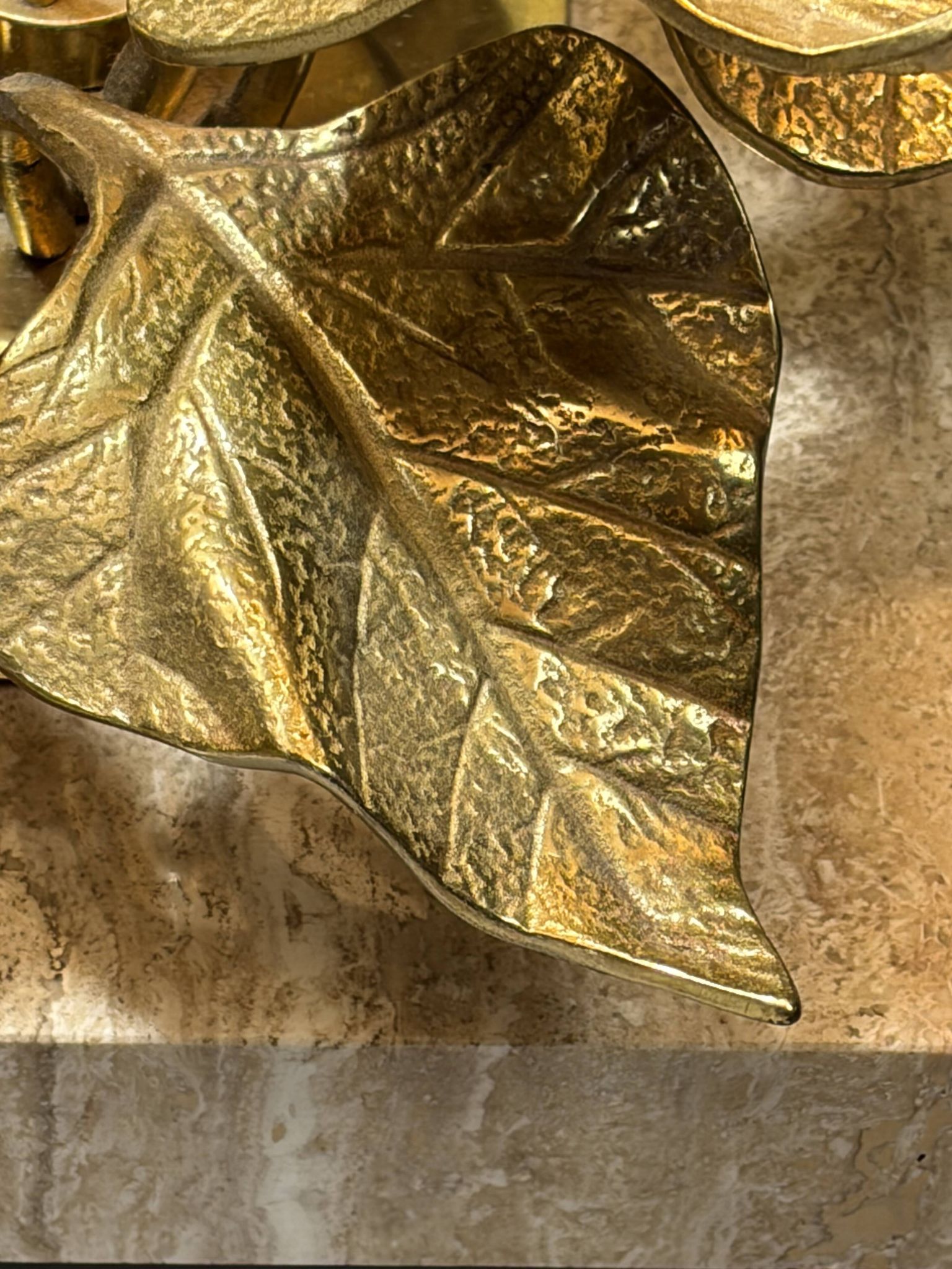 Bronze and travertine water lily lamp attributed to Maison Charles, circa 1970.