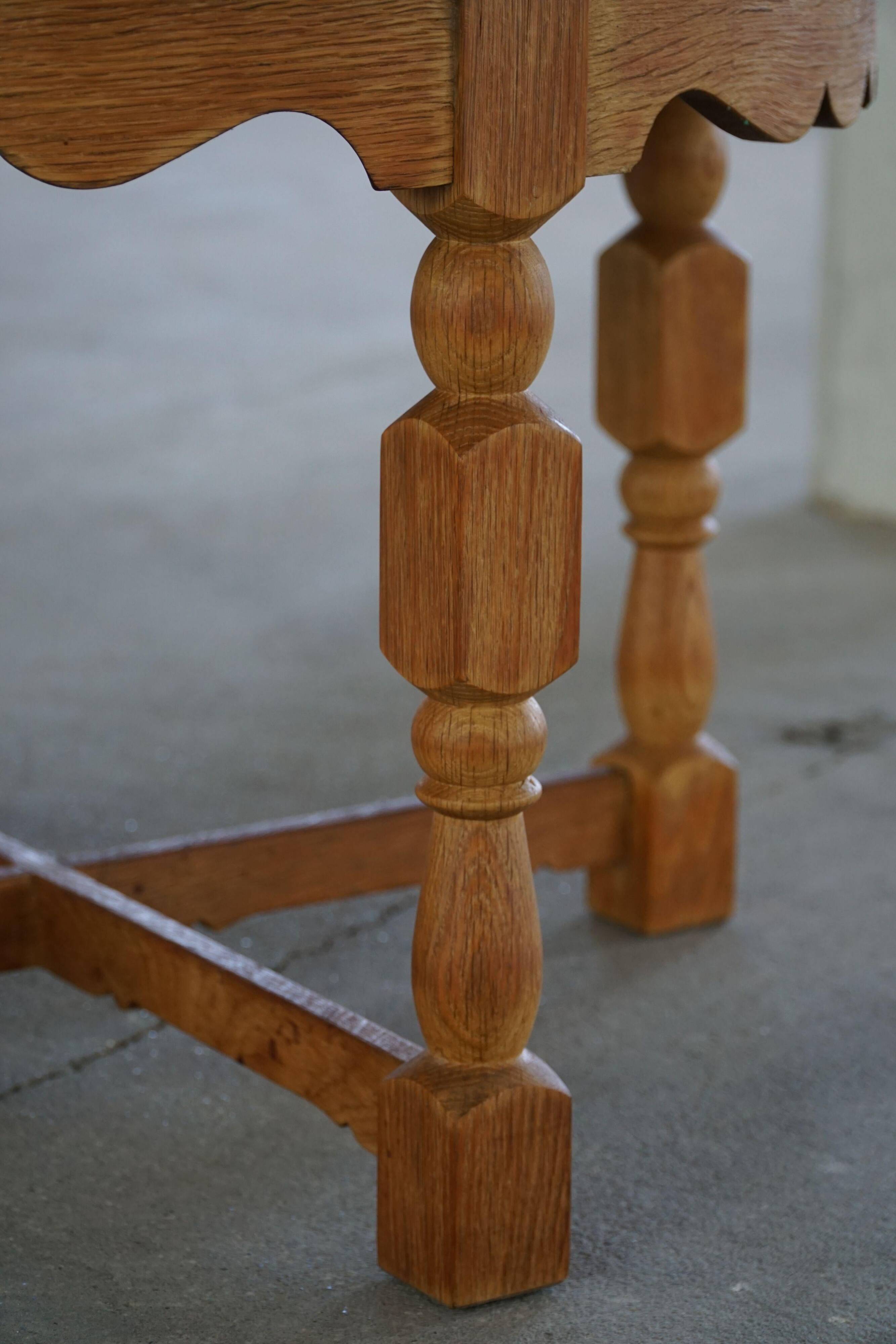 Mid-century Danish round side table in solid oak, Henning Kjærnulf, 1960s.