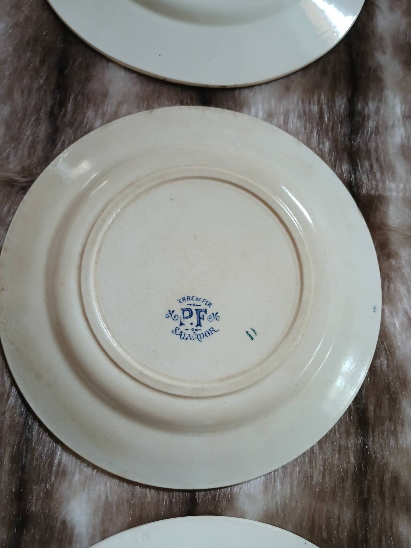 8 mismatched ironstone dinner plates