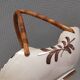 Beautiful small painted ceramic basket with woven handle