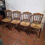 4 rustic farmhouse chairs made of wood and straw