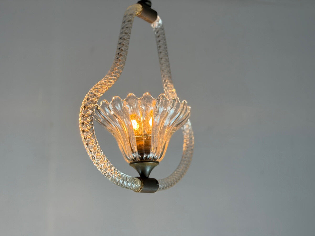 Venetian chandelier in colourless Murano glass and brass, circa 1950.