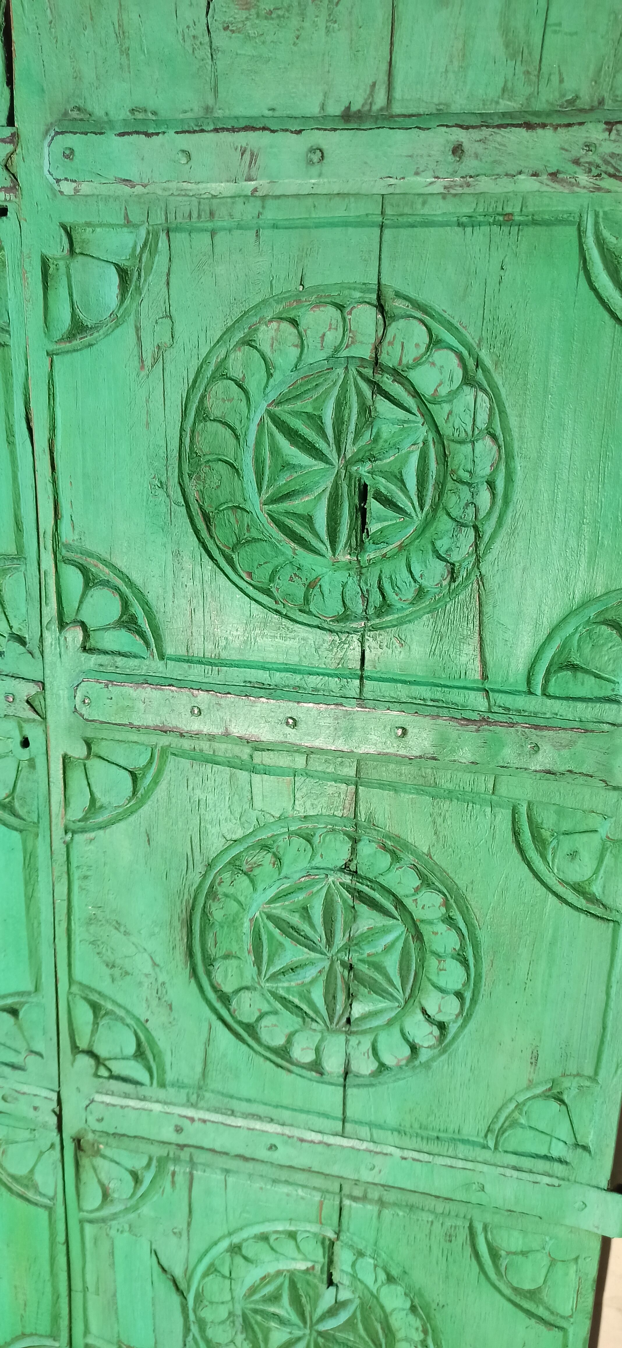 Old green wooden door