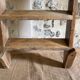 Decorative wooden ladder or towel rack.
