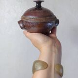 coffee service in iridescent stoneware cups and vintage sugar bowl