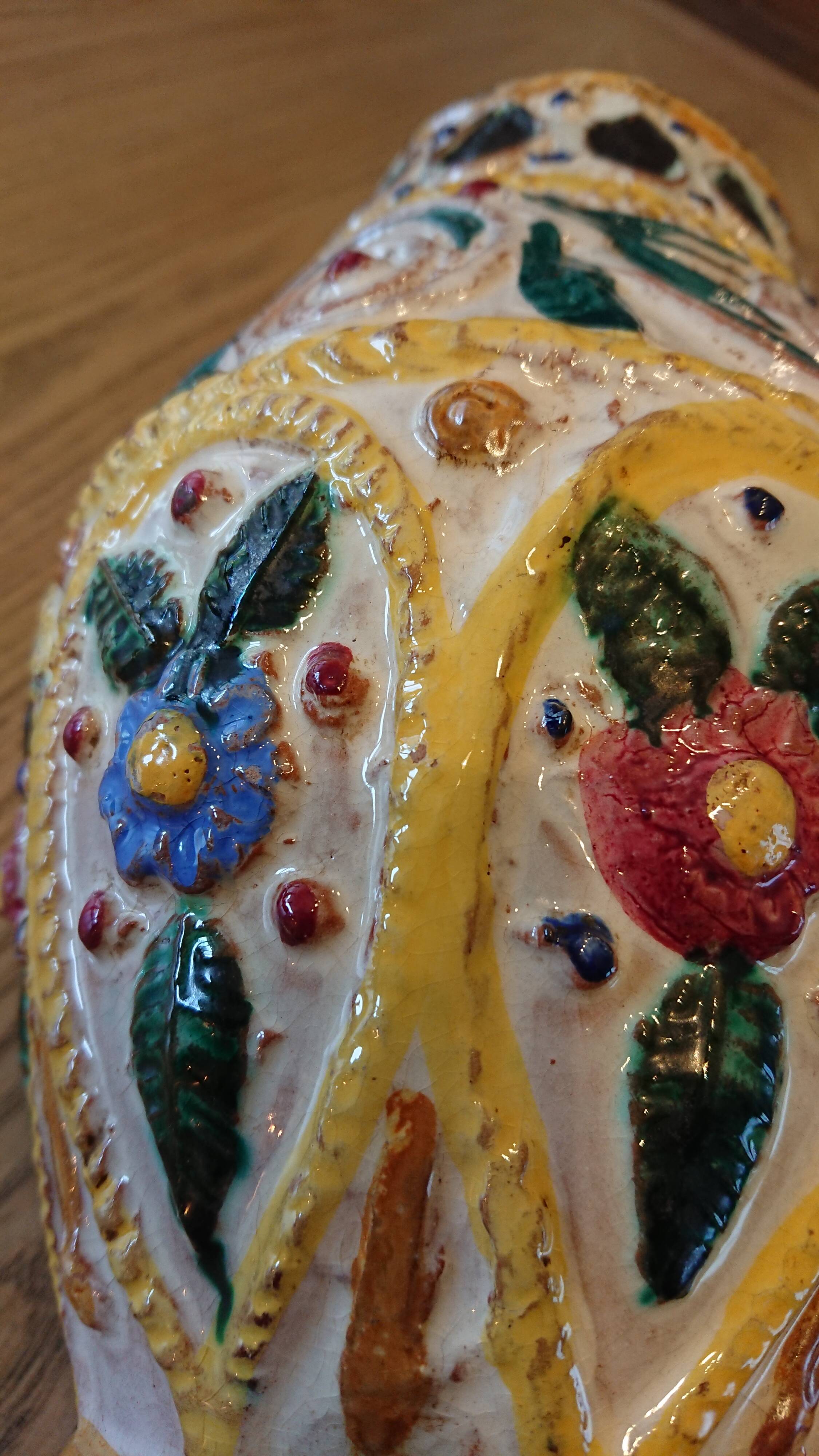 Hand-carved and hand-painted vase