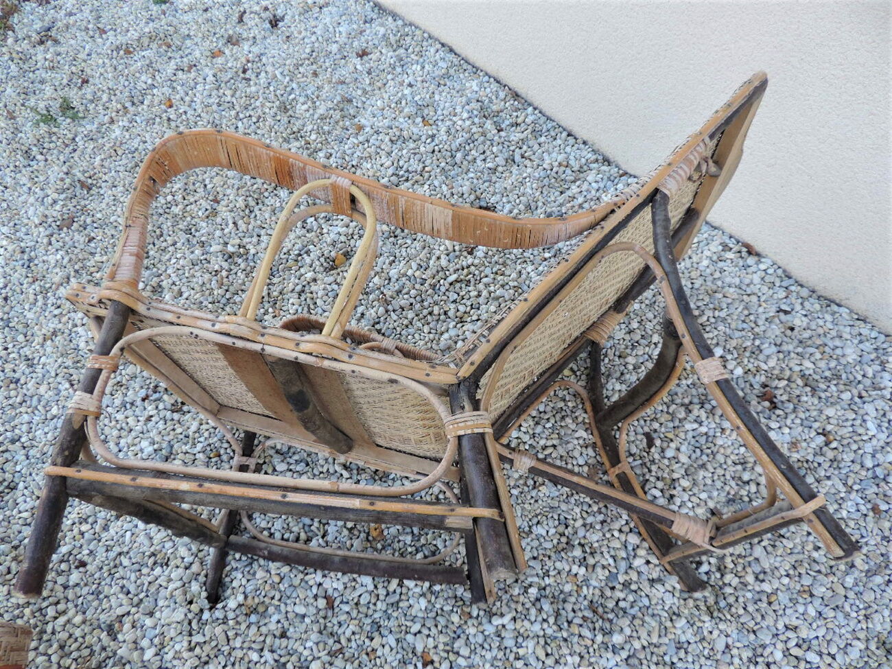 rattan chaise longue with its foot rest 1930