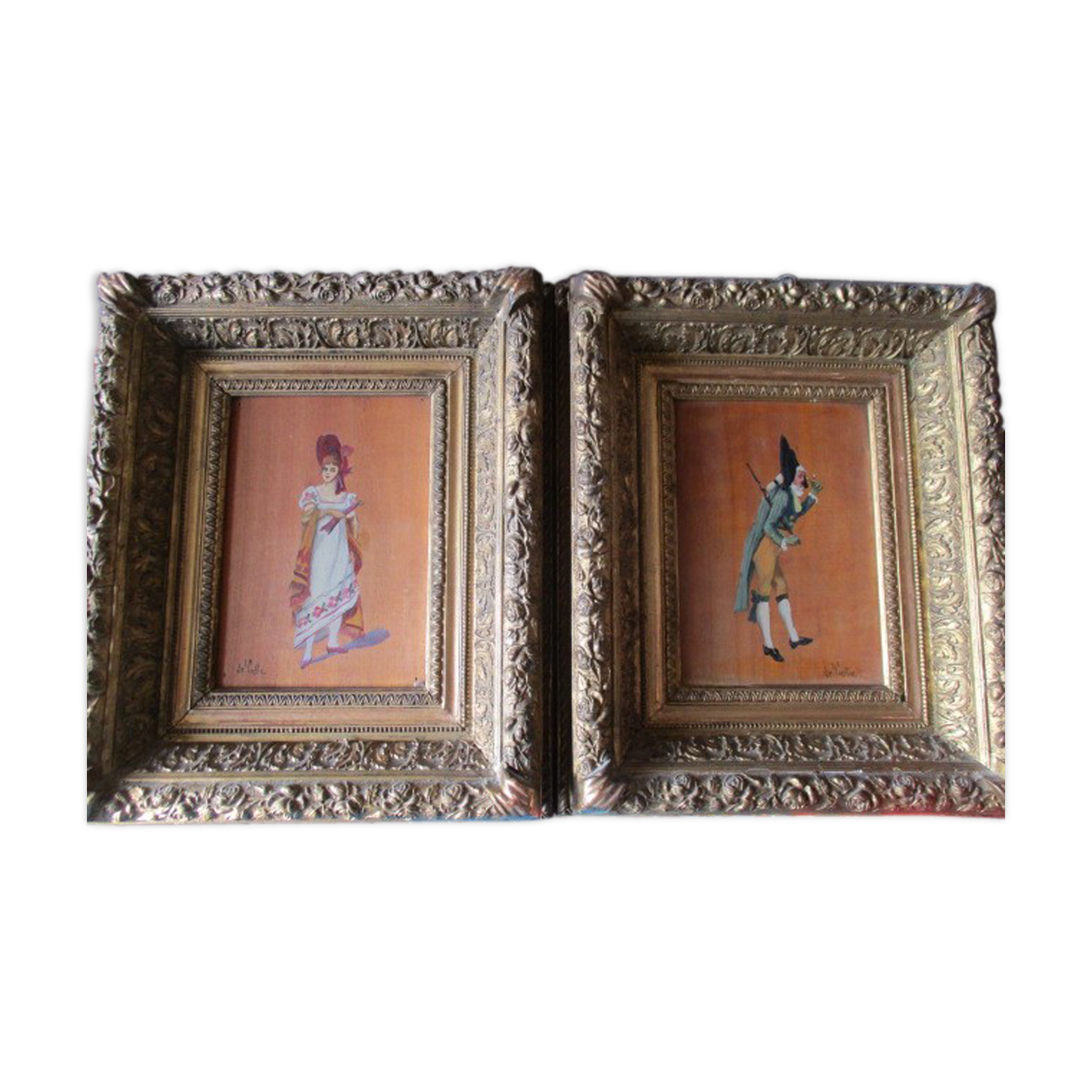 2 antique paintings from the 1700s in golden frame painter De'loste