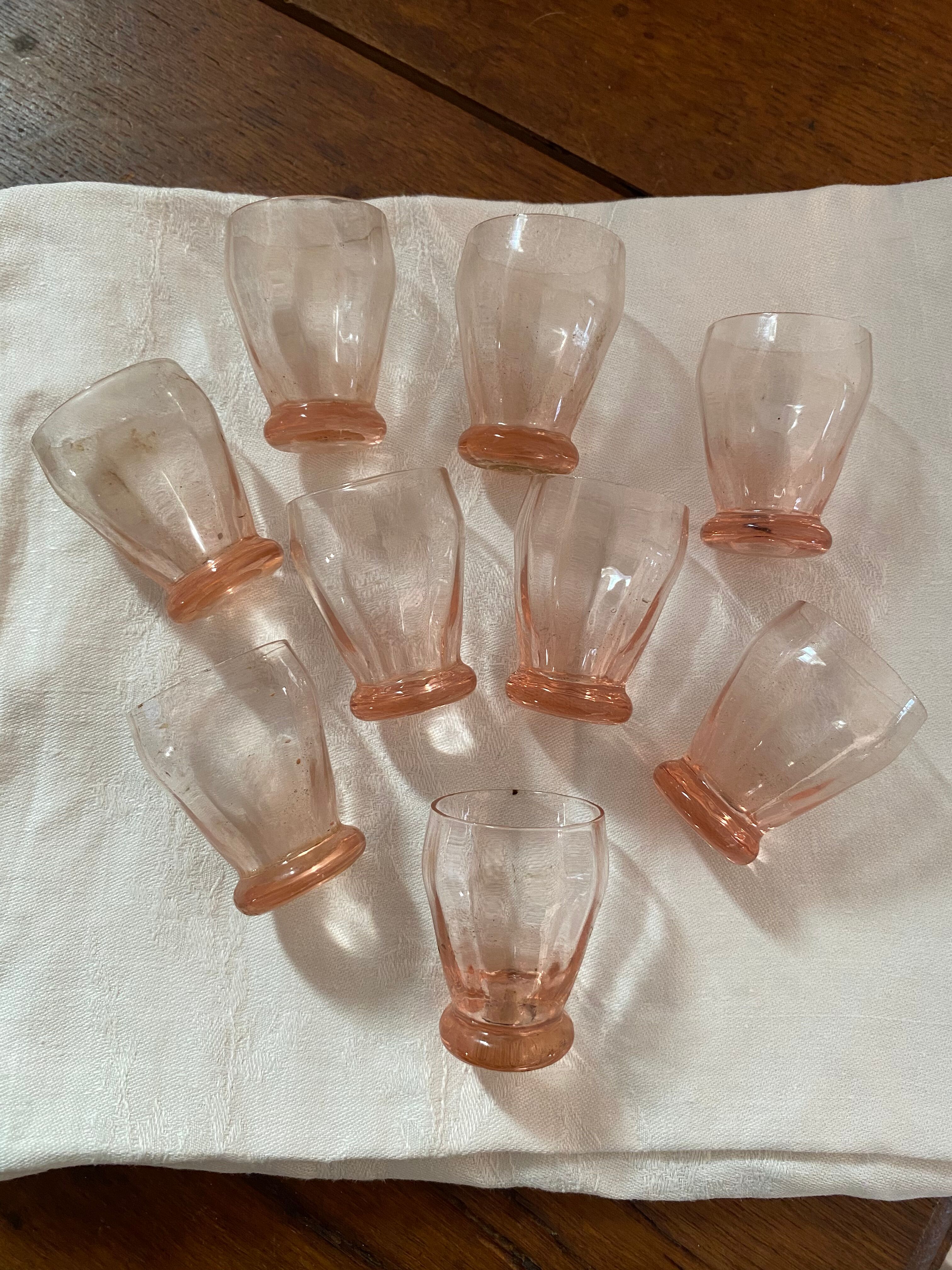 9 glasses vintage liqueur with pink glass.