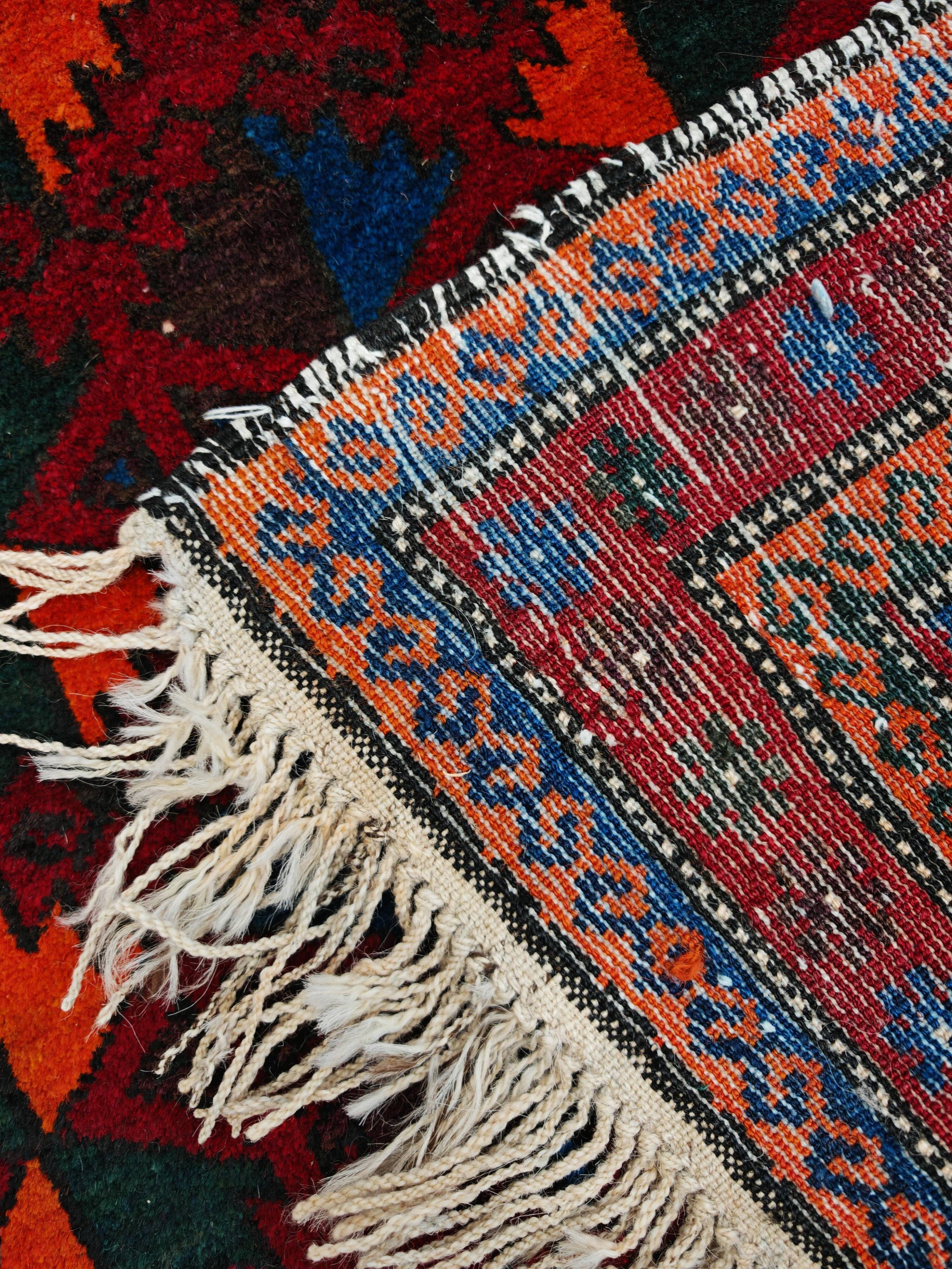 Vintage Baluchi prayer rug, hand-knotted, dyed wool from the 1970s.