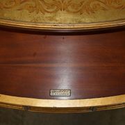 Half-moon console Eglomise Theodore Alexander with a gold finish.