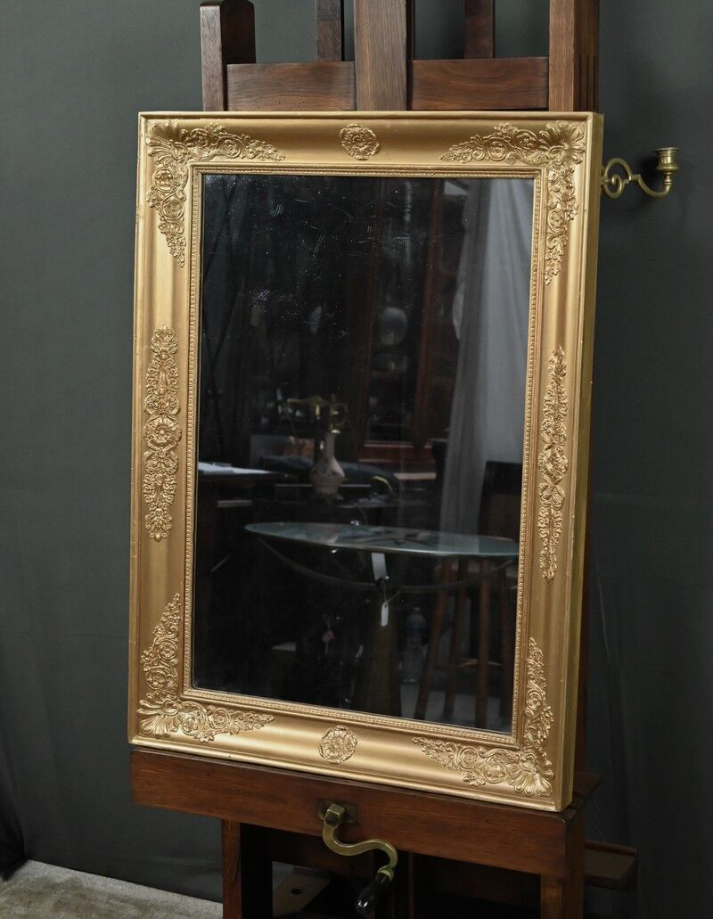 Important miroir en bois doré, style Restauration – Milieu XIXe