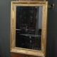 Important miroir en bois doré, style Restauration – Milieu XIXe