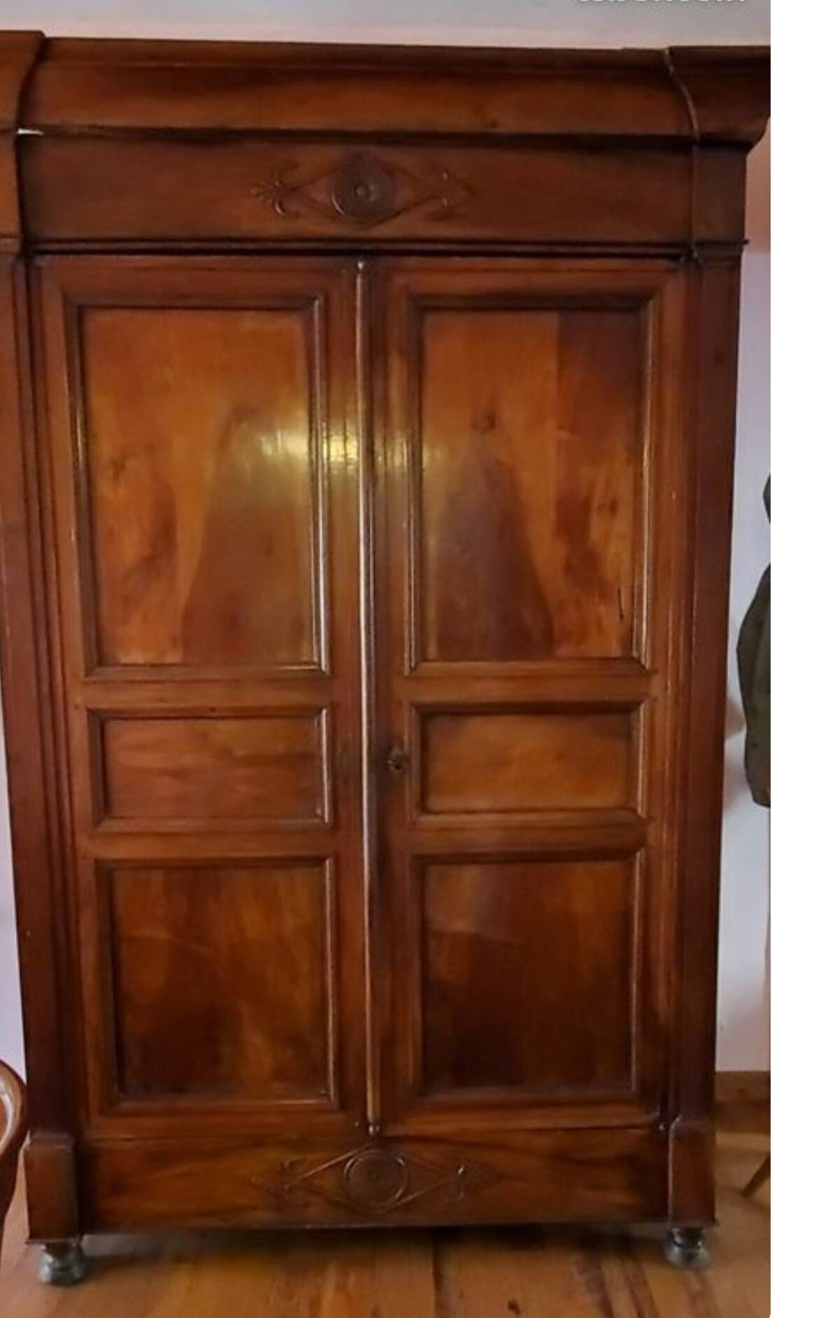 Directoire period wardrobe in solid walnut.