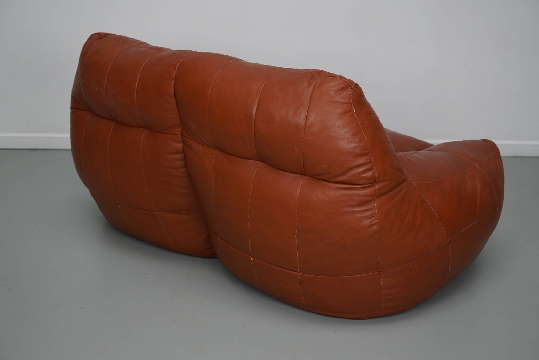 Pouf / Canapé 2 places en cuir patchwork vintage