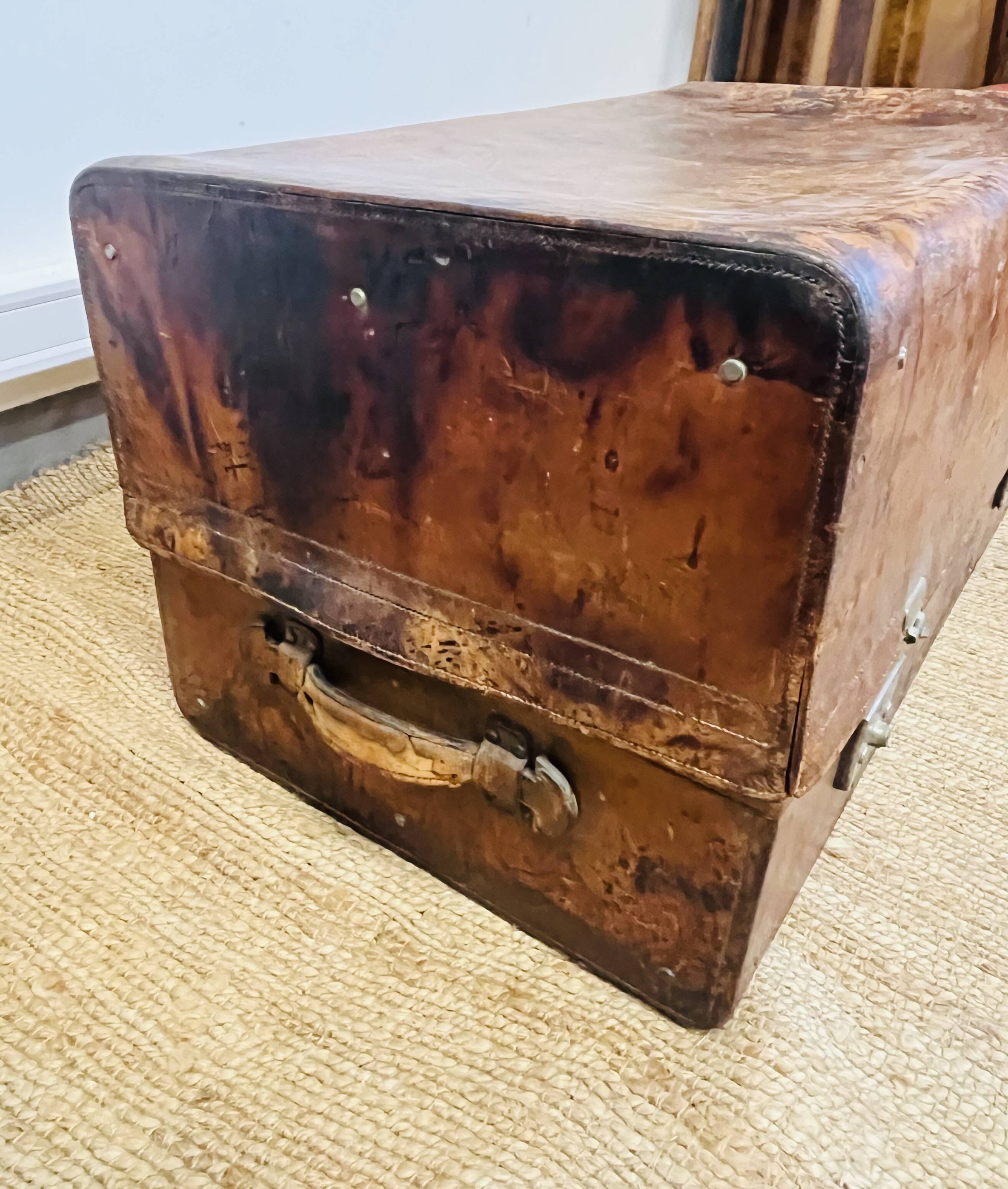 Large Gustave Keller leather trunk with multiple compartments