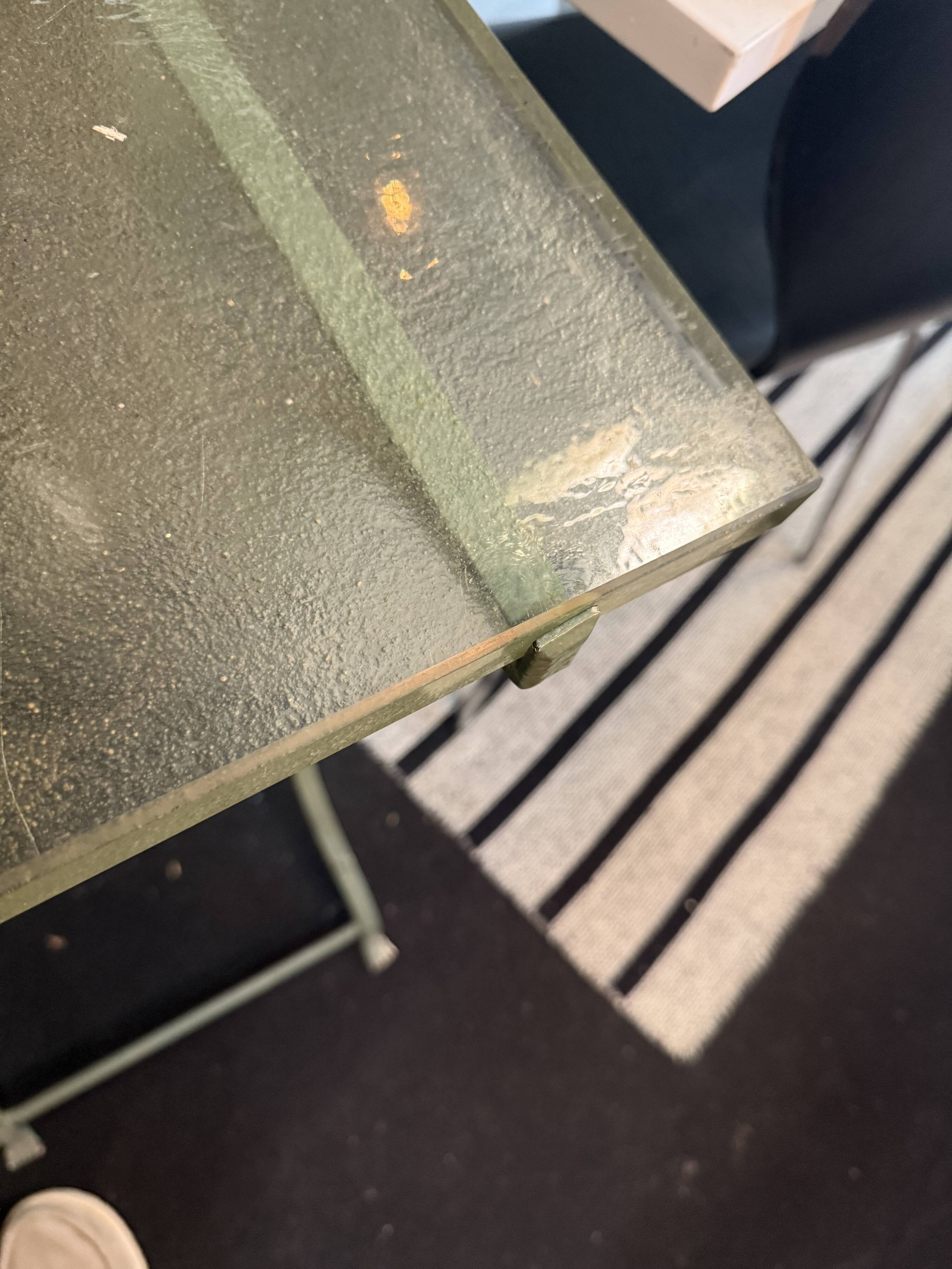Metal table with glass top