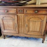 Old low buffet, 19th in rustic solid oak, carved and molded