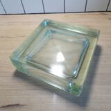 Glass block pocket emptier
