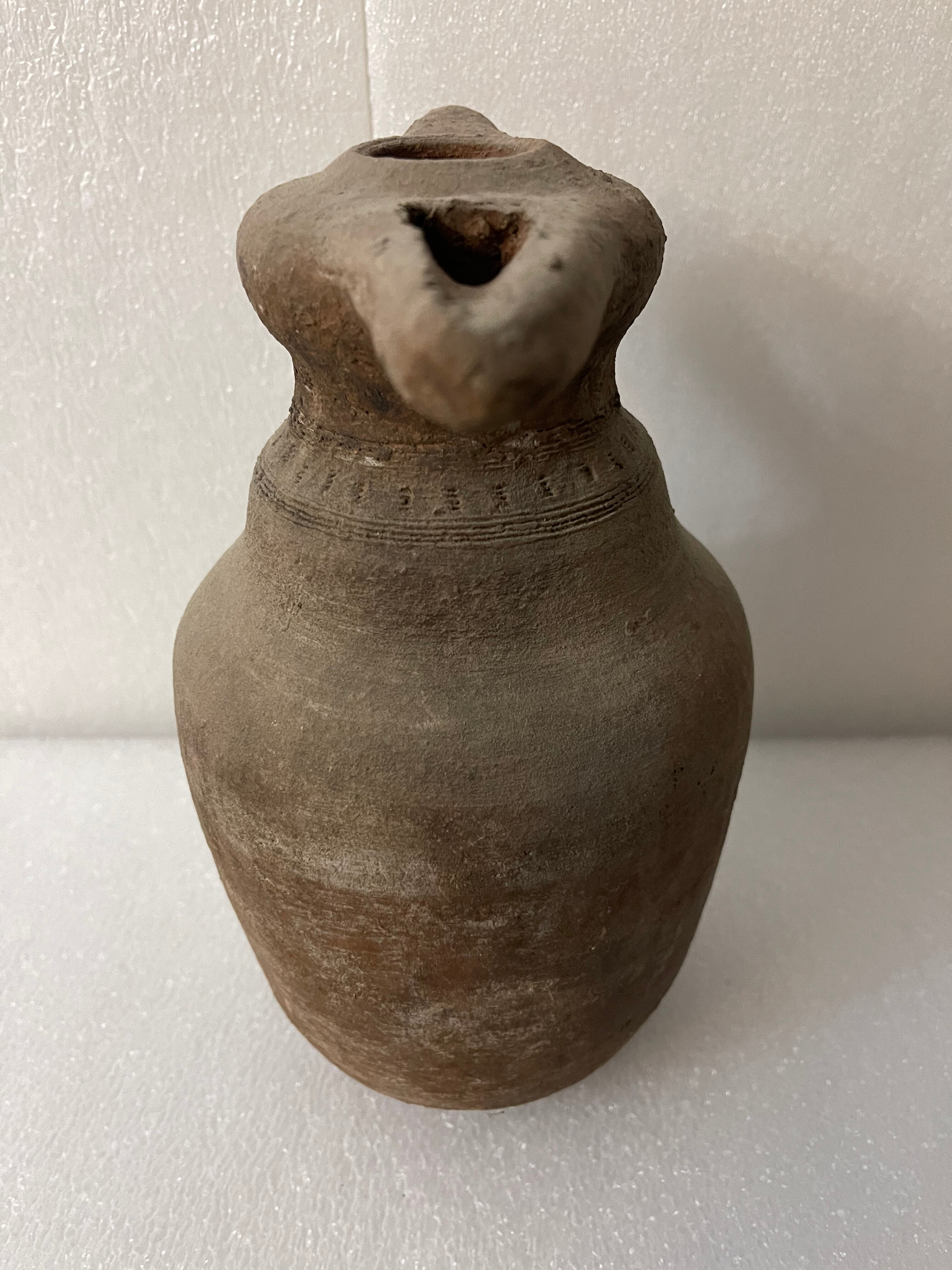 Zoomorphic pitcher with a beaked ancient Islamic ceramic birds