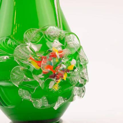 Excentric green blown glass vase with relief flowers Murano