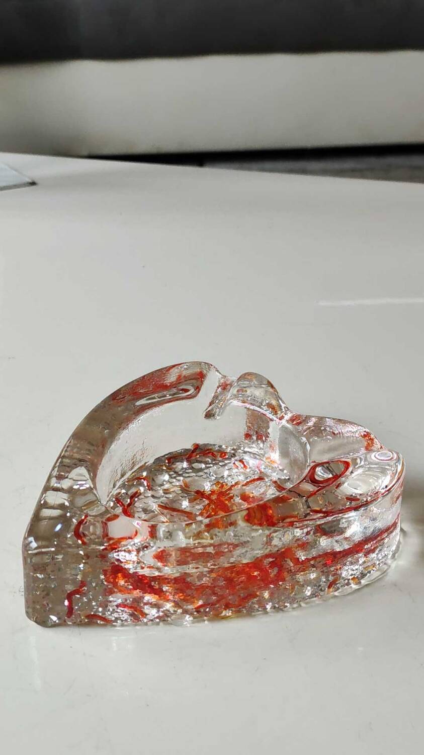 Empty pocket/Ashtray, l in blown art glass/Heart shape with inclusions of orange filaments. In Murano style