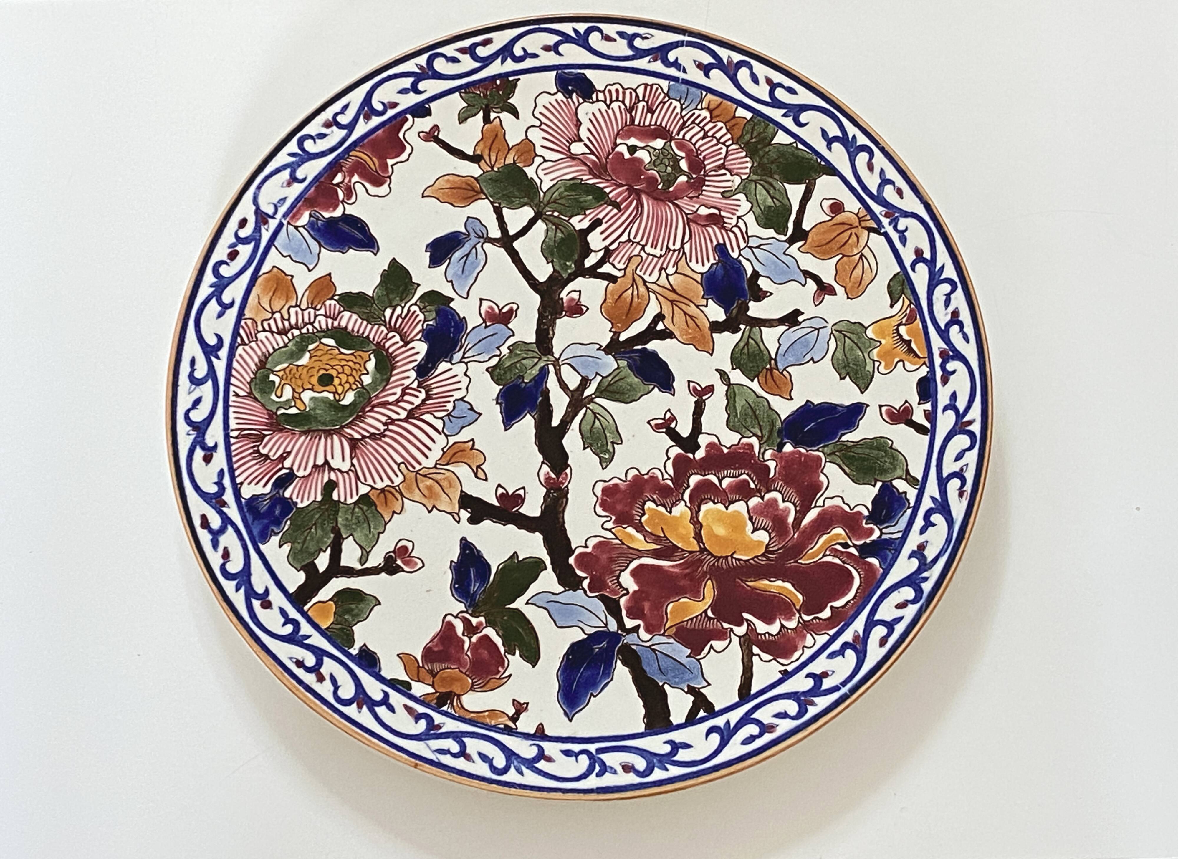 Round plate in Gien earthenware model Peonies