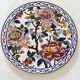 Round plate in Gien earthenware model Peonies