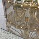 70s designer chandelier with smoked glass plates and gold metal frame