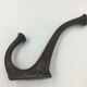 Set of 5 cast iron hooks early 20th