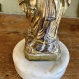 Virgin Mary crowned in metal and brass