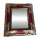 Old mirror with gold and red frame