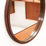 Round mirror in walnut