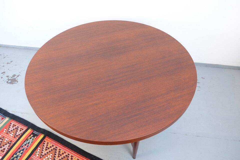 Vintage teak coffee table in 60s-70s style, retro style.