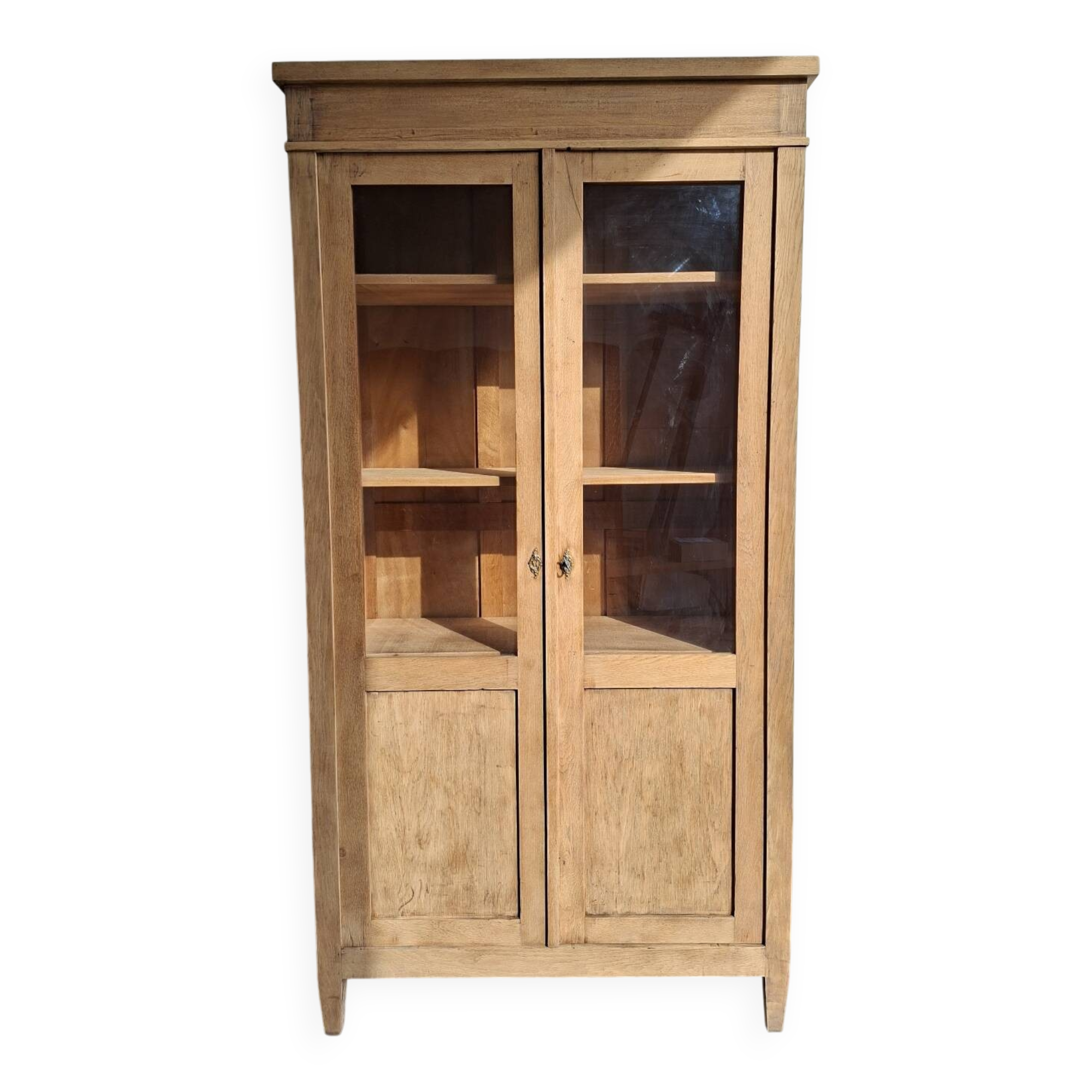 Large antique display cabinet in patinated solid oak.