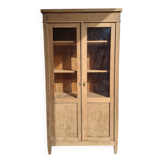 Large antique display cabinet in patinated solid oak.