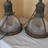 2 holophanous industrial lamps