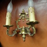 Pair of bronze double-arm appliques