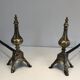 Paire de chenets en bronze ciselé et fer forgé de style Louis XVI