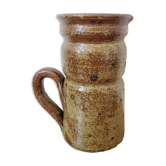 Pitcher vase in sandstone pyrity